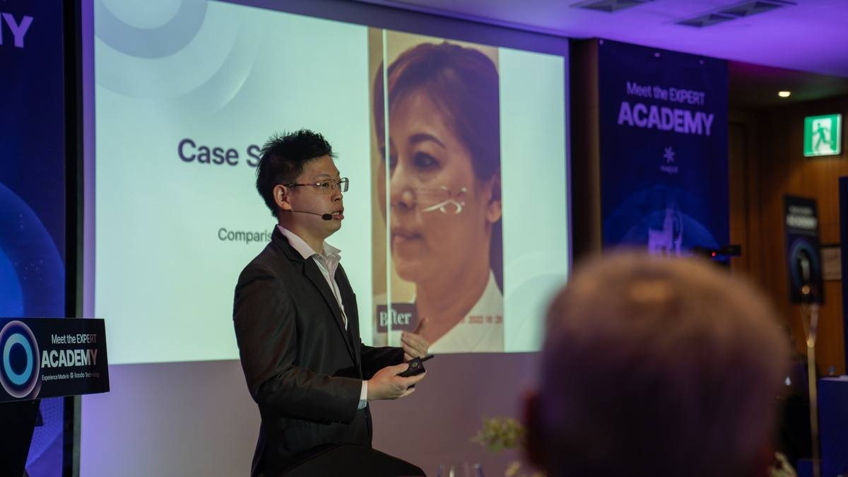 Dr. Sin Yong presenting case study comparison data at the ilooda Expert Academy 2024